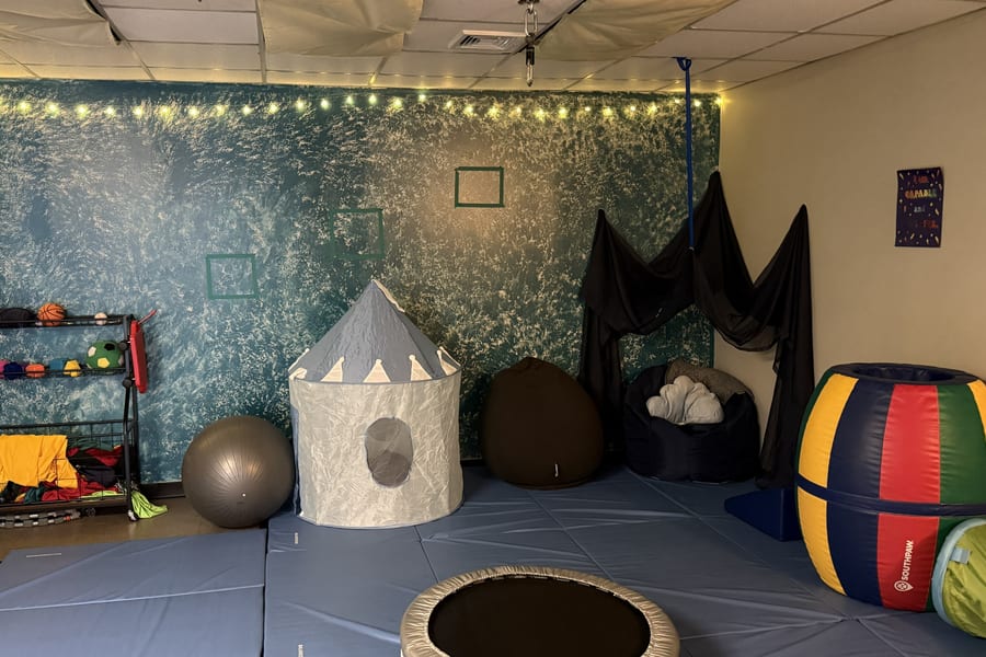 Indoor play space with exercise equipment